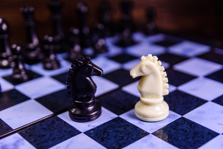 Composition of the chess pieces on chess boardの写真素材