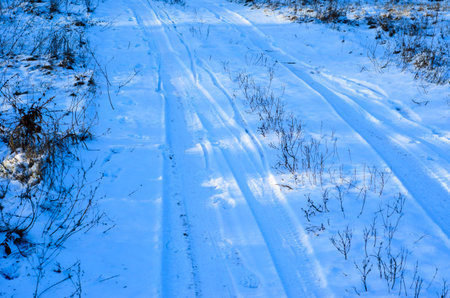 Details of the car tire track in snow