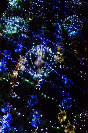 Illumination of the Christmas tree on a central square of the city Kremenchug, Ukraineの写真素材