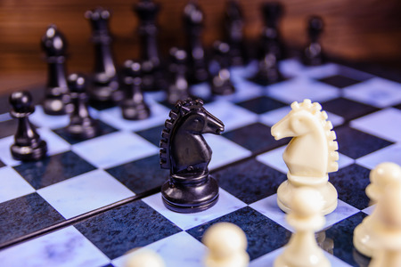 Composition of the chess pieces on chess boardの写真素材