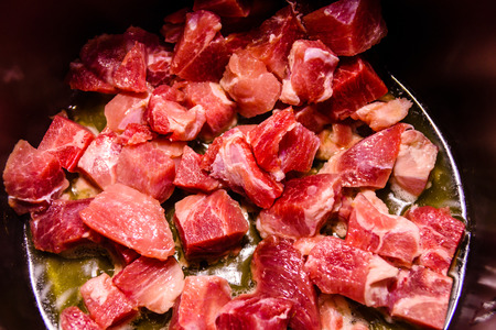 Pork meat preparing in the slow cookerの写真素材