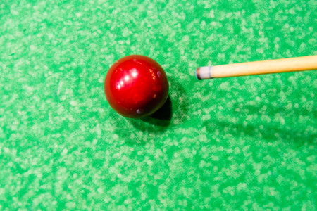 Red ball on a green cloth. Russian billiard