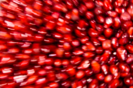 Abstract and defocused red background. Blurred motionの写真素材