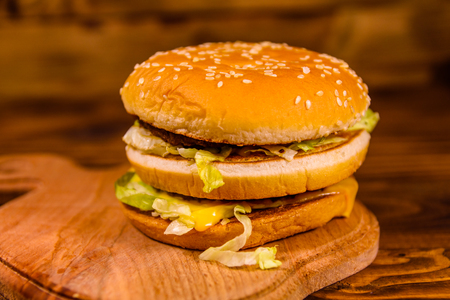 Fresh hamburger on a rustic wooden tableの写真素材