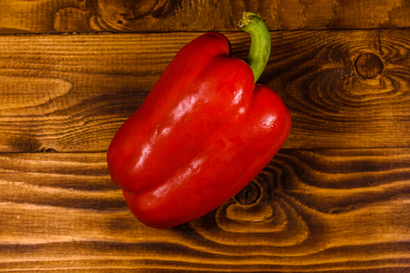 Red bulgarian pepper on rustic wooden tableの写真素材