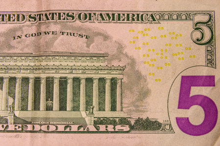 Closeup of the american five dollars banknote