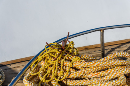 Ropes and different tackles on a yachtの写真素材