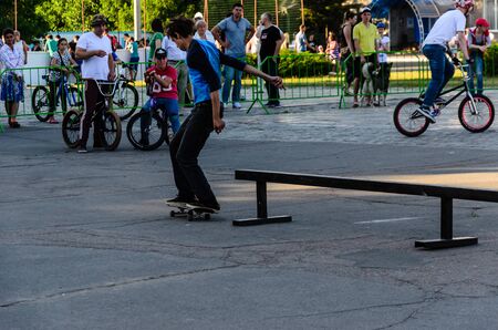 Kremenchug, Ukraine - June 05, 2017: Skater doing differenr tricks in skatepark during the festival of street cultureのeditorial素材