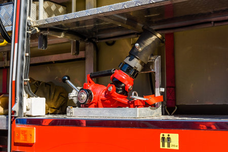Closeup of modern fire truck with firefighting equipment