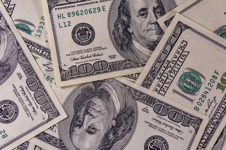 Background of many american one hundred dollar banknotesの写真素材