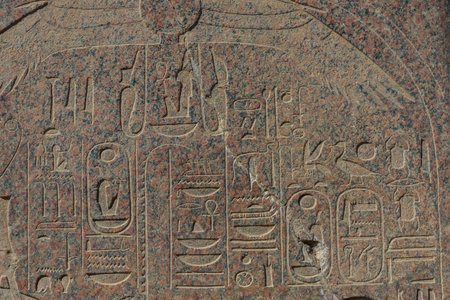 Egyptian ancient hieroglyphs on a stone wall