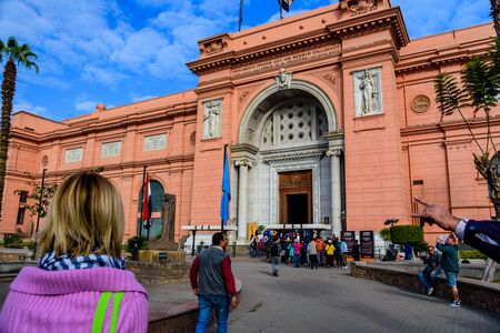 Cairo, Egypt - December 8, 2018: Many tourists near the Museum of Egyptian Antiquities (known commonly as the Egyptian Museum or Museum of Cairo)のeditorial素材