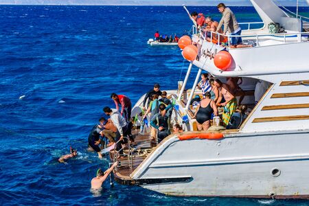Hurghada, Egypt - December 7, 2018: People spending time on white yacht in Red sea not far from Hurghada city, Egyptのeditorial素材