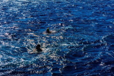 Hurghada, Egypt - December 7, 2018: Group of tourists snorkeling in Red sea. Summer vacation conceptのeditorial素材
