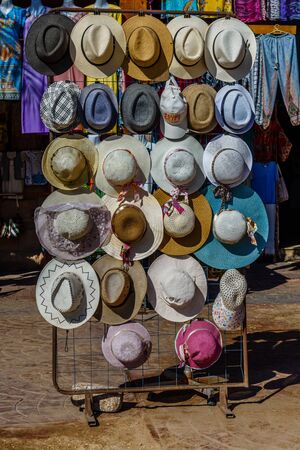Different hats for sale in street shopの写真素材