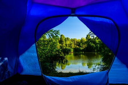 View on river from tent in morningの写真素材