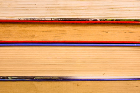 Stack of different old books for background
