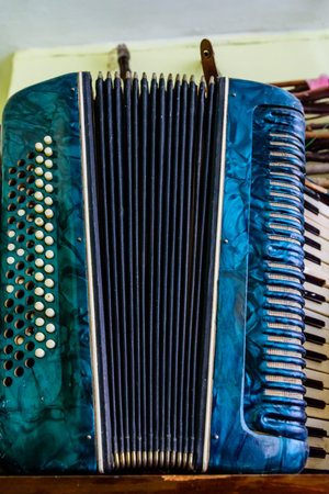 Old accordion. Vintage russian ethnic musical instrument