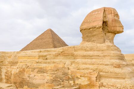Great pyramid of Cheops and Sphinx in Giza plateau. Cairo, Egyptの写真素材