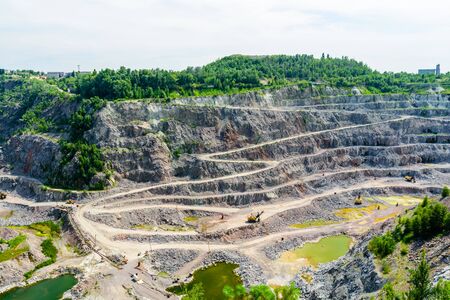View on cliffs in a granite quarryの写真素材