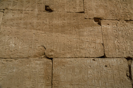 Egyptian ancient hieroglyphs on a stone wall
