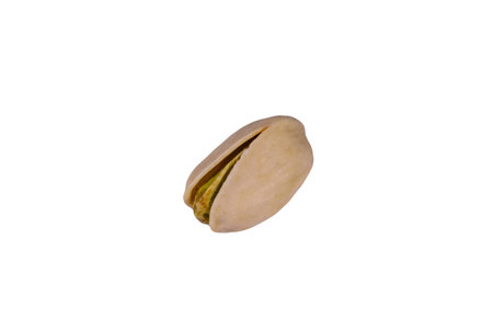 One pistachio nut isolated on white background