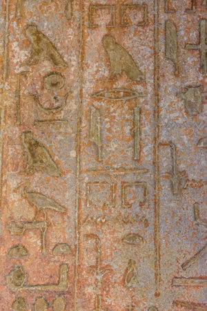 Egyptian ancient hieroglyphs on a stone wall