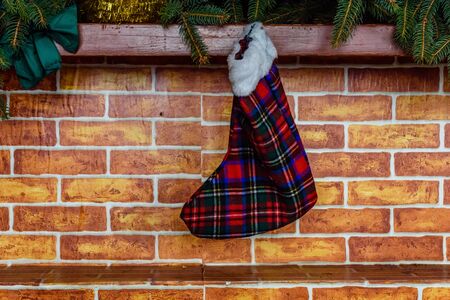 Branches of fir tree and christmas stockingの写真素材