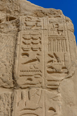Egyptian ancient hieroglyphs on a stone wall