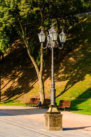 Old lantern in city park on summerの写真素材