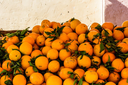 Ripe orange fruits for sale on fruit market