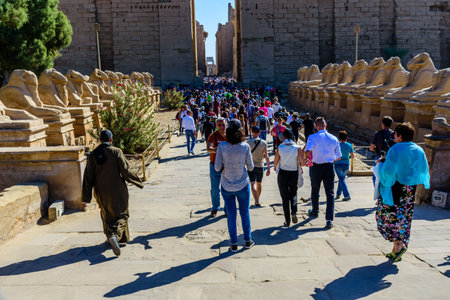 Luxor, Egypt - December 11, 2018: Many tourists in Karnak temple. Luxor, Egypt