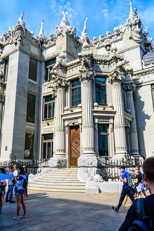 Kiev, Ukraine - August 23, 2019: People near house with chimeras in Kiev, Ukraine. Art Nouveau building with sculptures of mythical animals was created by architect Vladislav Gorodetsky in 1903.のeditorial素材