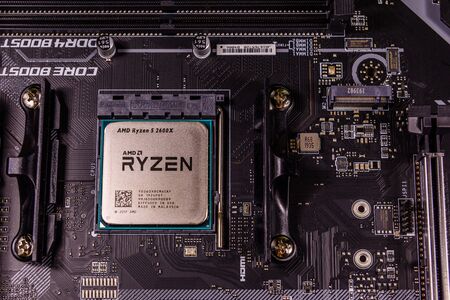 Kremenchug, Ukraine - November 20, 2019: Closeup of modern computer motherboard MSI Tomahawk max with installed cpu AMD Ryzen 5 2600xのeditorial素材