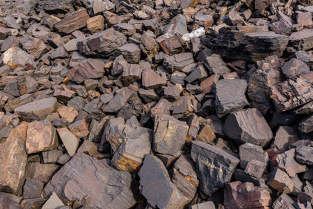 Background of the stones near iron ore quarry