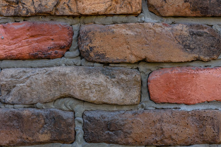 Old wall of red bricks for background