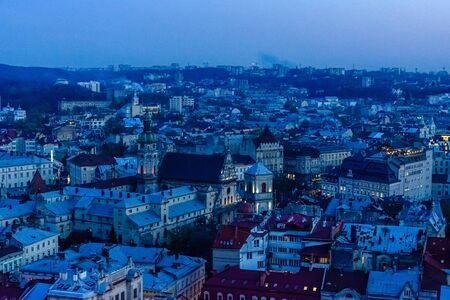 View on historic center of Lviv at evening. View on Lvov cityscape from the town hallの写真素材