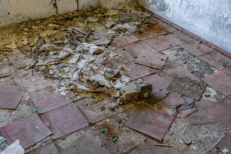 Abandoned apartment in the destroyed residential houseの写真素材