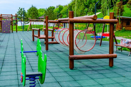 Different equipment on children playground in city park