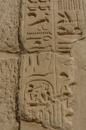 Egyptian ancient hieroglyphs on a stone wall