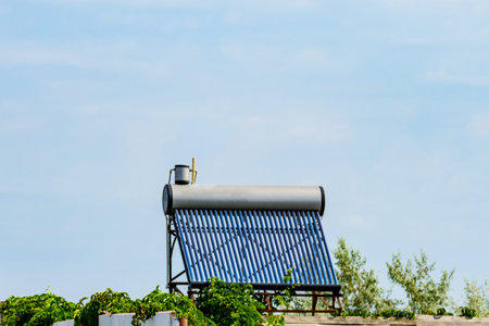 Solar water heater on roof of residential house. Clean energy. Ecological concept