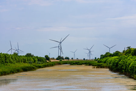 Wind turbines near North Crimean channel in Kherson region, Ukraine. Clean energy. Ecological...