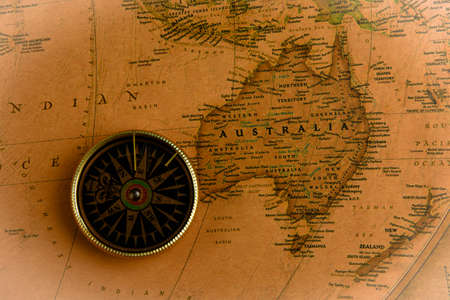Compass on old map of world. Journey and discovery conceptの写真素材