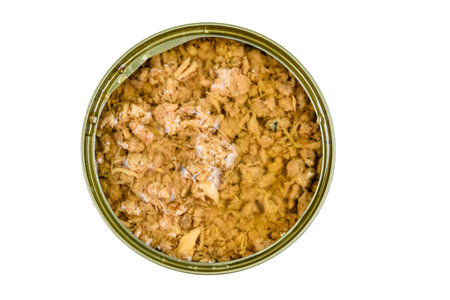 Open tin can with tuna fish isolated on white background