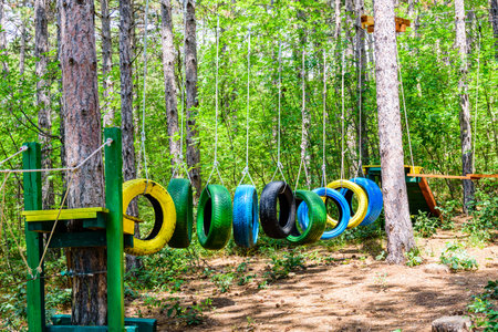 Old painted car tires at obstacle course
