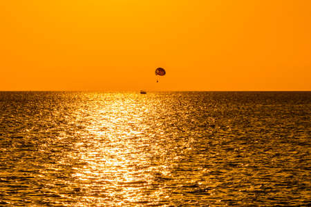 Parasailing in Indian ocean near Zanzibar island. Active and extreme recreationの写真素材