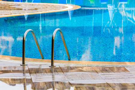 View on swimming pool with turquoise clear water