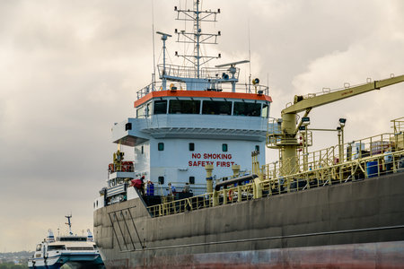 Cargo ship waiting near port of Stone town. Zanzibar, Tanzania