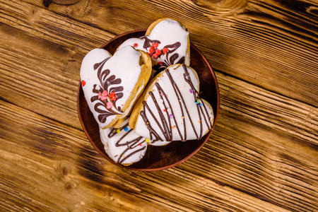 Cookies made in shape of heart on wooden background. top viewの写真素材