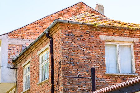 Ancient red brick residential building in Nessebar, Bulgariaの写真素材